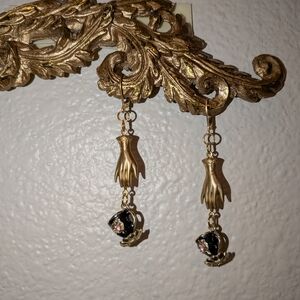 Elegant Gold Hand Earrings with Black and Pink Teacups